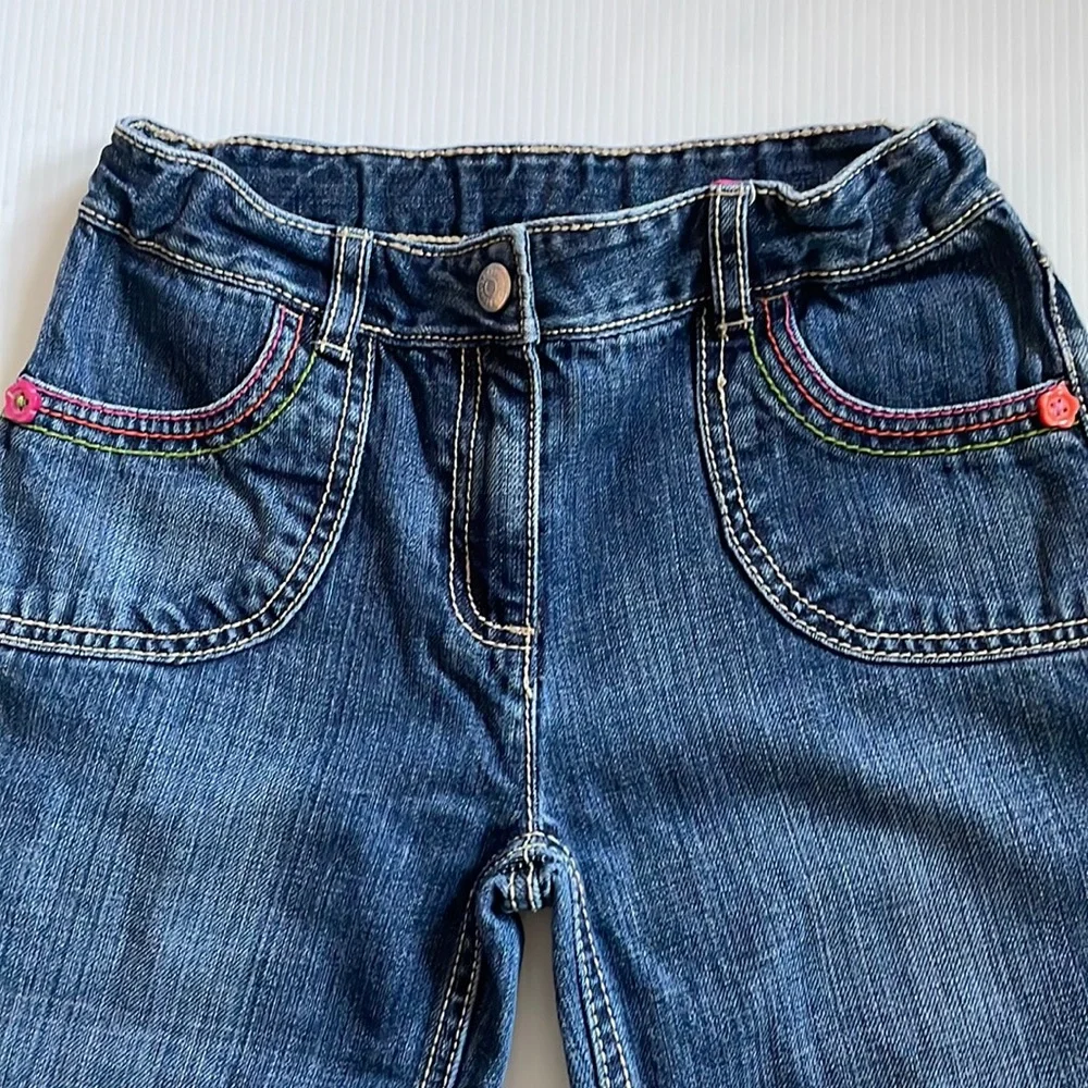 Gymboree jeans, cuffed with colored buttons & colorful threading. Girls size 10